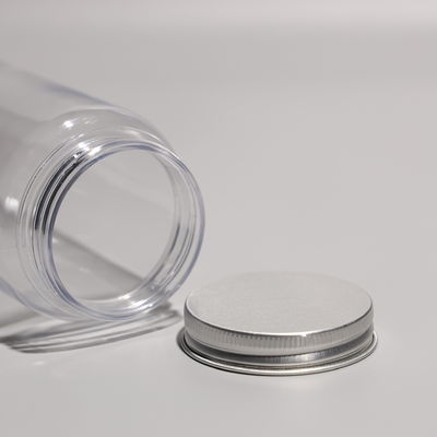 Yuvarlak PET Plastik Şişeler Alüminyum Kapaklı veya Plastik Kapaklı BPA Serbest Alışverişli Meyve Şişeleri