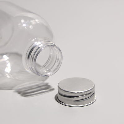 Przejrzyste butelki PET ze śrubą na aluminium